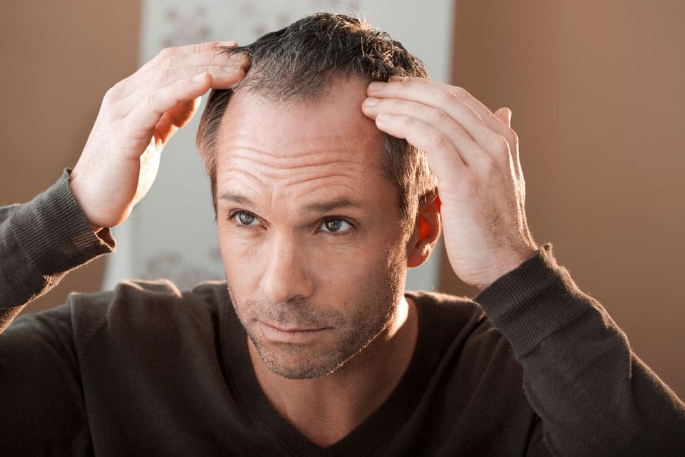 Cómo reducir la caída del cabello y fortalecerlo nuevamente